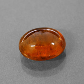 3.17 ct Orange Spessartite Garnet Gemstone, Spessartite Garnet Gem in Oval Cabochon Shape for Sale.
