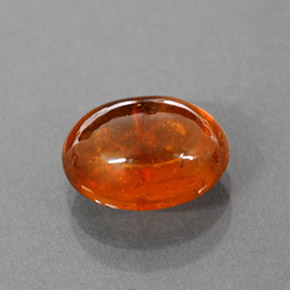 3.35 ct Orange Spessartite Garnet Gemstone, Spessartite Garnet Gem in Oval Cabochon Shape for Sale.