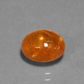4.22 ct Orange Spessartite Garnet Gemstone, Spessartite Garnet Gem in Oval Cabochon Shape for Sale.