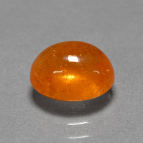 3.06 ct Orange Spessartite Garnet Gemstone, Spessartite Garnet Gem in Oval Cabochon Shape for Sale.