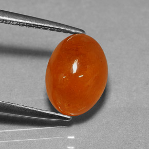 4.74 ct Orange Spessartite Garnet Gemstone, Spessartite Garnet Gem in Oval Cabochon Shape for Sale.