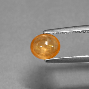 1.01 ct Orange Spessartite Garnet Gemstone, Spessartite Garnet Gem in Oval Cabochon Shape for Sale.