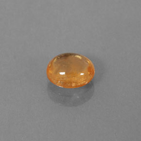 0.86 ct Orange Spessartite Garnet Gemstone, Spessartite Garnet Gem in Oval Cabochon Shape for Sale.