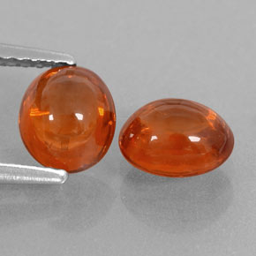 ミディアムオレンジ スペサルティン ガーネット 宝石 - 1.4ct オーバル カボション (ID: 329402)