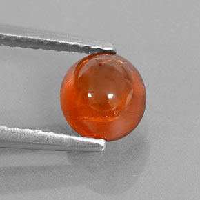 1.98 ct Orange Spessartite Garnet Gemstone, Spessartite Garnet Gem in Oval Cabochon Shape for Sale.