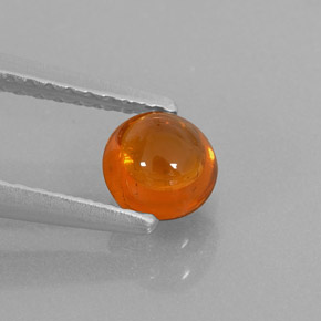 0.78 ct Orange Spessartite Garnet Gemstone, Spessartite Garnet Gem in Round Cabochon Shape for Sale.