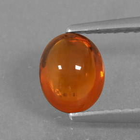 1.50 ct Orange Spessartite Garnet Gemstone, Spessartite Garnet Gem in Oval Cabochon Shape for Sale.