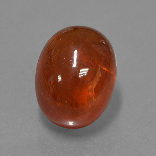 Reddish Orange Spessartite Garnet Gem - 10.4ct Oval Cabochon (ID: 424323)