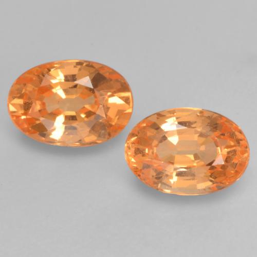 2pc Matching Oval Orange Spessartite Garnets in Size 5.6 x 3.9mm, Weight 1.21ct total / avg. 0.61ct each, Bright Orange in VS Clarity, Natural untreated Gemstone, Mohs Hardness 6.5 - 7.5 suitable for daily wear jewelry, Photo A