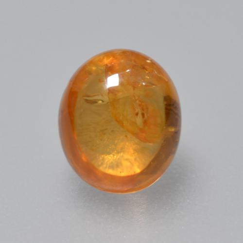 Bright Orange Spessartite Garnet Gem - 0.9ct Oval Cabochon (ID: 561986)