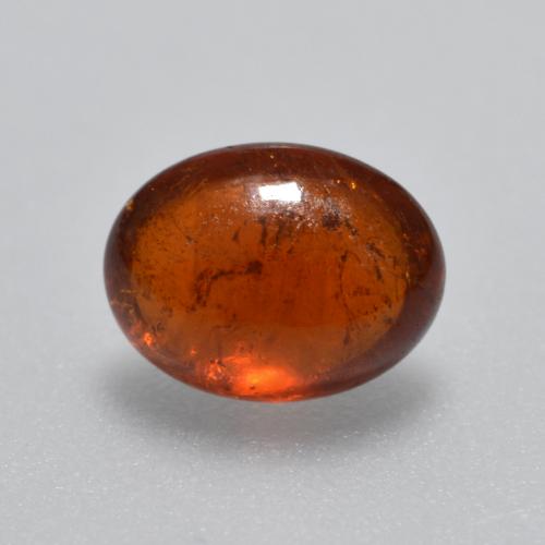 Reddish Orange Spessartite Garnet Gem - 1.7ct Oval Cabochon (ID: 561989)
