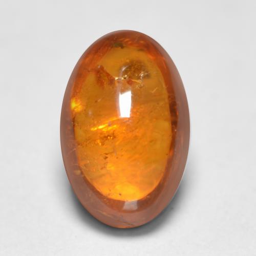 Naranja medio Granate Espesartina Gema - 0.8ct Cabujón Óvalo (ID: 562693)