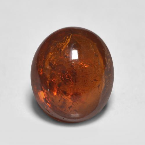 Naranja oscuro Granate Espesartina Gema - 1ct Cabujón Óvalo (ID: 562698)