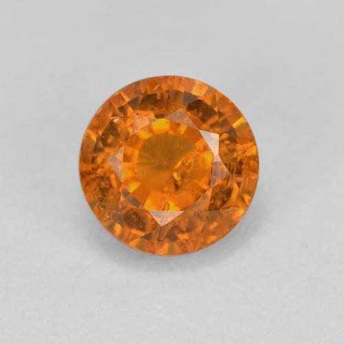 Deep Orange Spessartite Garnet Gem - 0.6ct Round Facet (ID: 596041)