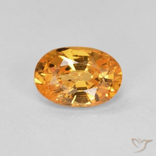 0.60 ct Orange Spessartite Garnet Gemstone, Spessartite Garnet Gem in Oval Facet Shape for Sale.