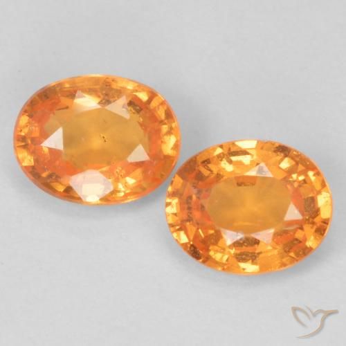 5,1 x 4mm Oval Spessartin-Granat-Paar - Gewicht 0,93 ct gesamt / durchschnittl. 0,47 ct, Garantiert natürliche Edelsteine, Hellorange Farbe in VS Reinheit, Mohs-Härte 6,5 - 7,5 Geeignet für den täglichen Gebrauch im Schmuck, Photo A