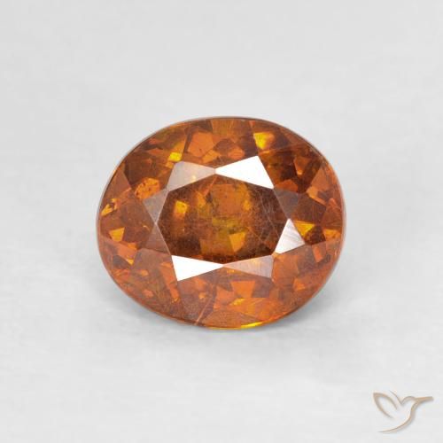 1,28 ct orangefarbener Sphalerit, 6,6 x 5,6 mm ovaler Schliff aus Spanien, Photo A