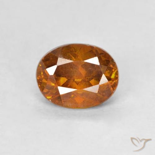 0,64 ct orangefarbener Sphalerit, 5,3 x 4,2 mm ovaler Schliff aus Spanien, Photo A
