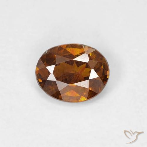0,31 ct orangefarbener Sphalerit, 4,7 x 3,8 mm ovaler Schliff aus Spanien, Photo A