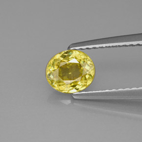 0.75 ct Yellow Sphene Gemstone, Sphene Gem in Oval Facet Shape for Sale.