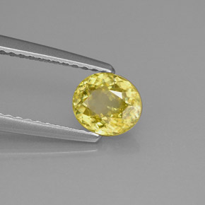 0.75 ct Yellow Sphene Stone, Natural Sphene in Oval Facet Shape for Sale