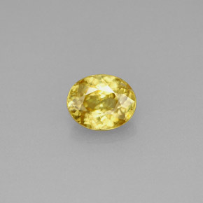 0.75 ct Yellow Sphene Gemstone, Sphene Gem in Oval Facet Shape for Sale.