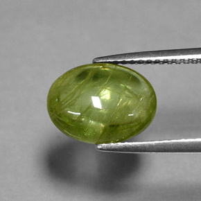 3.57 ct Green Sphene Gemstone, Sphene Gem in Oval Cabochon Shape for Sale.