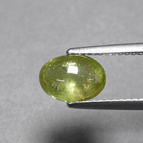 1.66 ct Green Sphene Gemstone, Sphene Gem in Oval Cabochon Shape for Sale.
