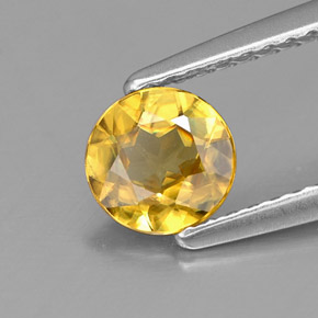 0.64 ct Yellow Sphene Gemstone, Sphene Gem in Round Facet Shape for Sale.