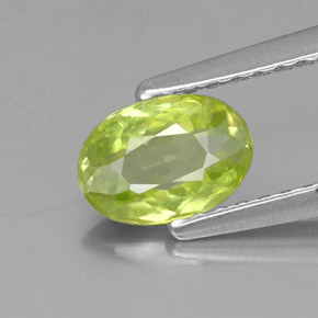 0.64 ct Green Sphene Gemstone, Sphene Gem in Oval Facet Shape for Sale.
