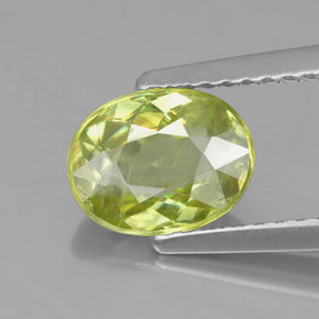 1.52 ct Green Sphene Gemstone, Sphene Gem in Oval Facet Shape for Sale.