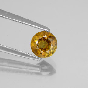 0.61 ct Orange Sphene Gemstone, Sphene Gem in Round Facet Shape for Sale.