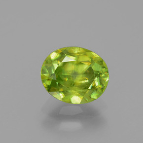 1.3ct Oval Facet Golden Green Sphene Gem for sale 1.3ct Oval Facet Golden Green Sphene Gem (ID: 391237)