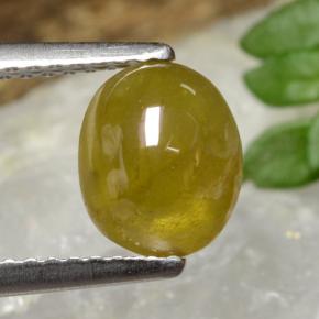 2.1ct Oval Cabochon Greenish Golden Sphene for sale thumb image of 2.1ct Oval Cabochon Greenish Golden Sphene (ID: 470831)