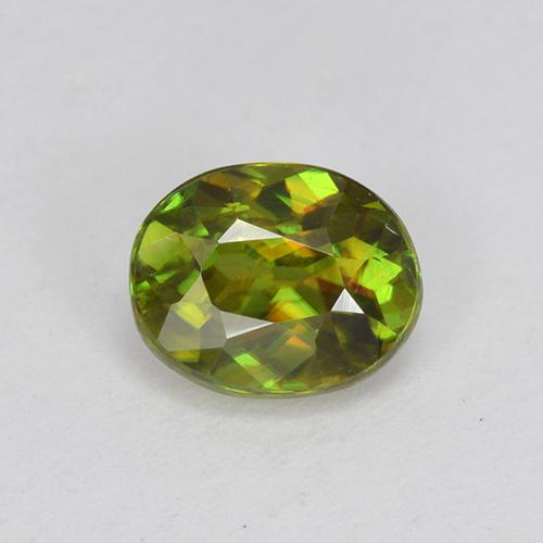 0.73 ct Green Sphene Gemstone, Sphene Gem in Oval Facet Shape for Sale.