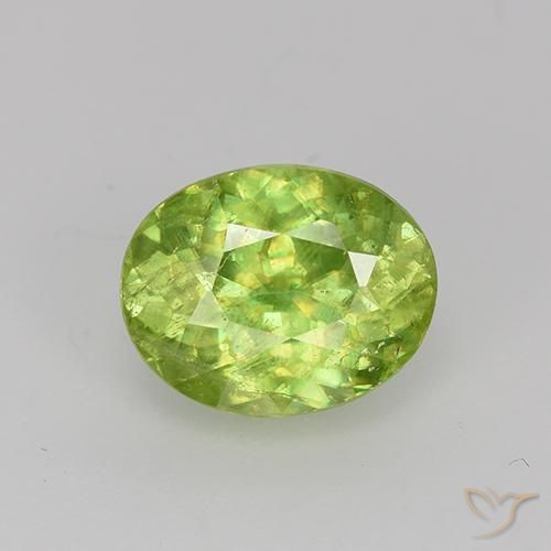 Lively Green Sphene Gem - 1.5ct Oval Facet (ID: 526853)