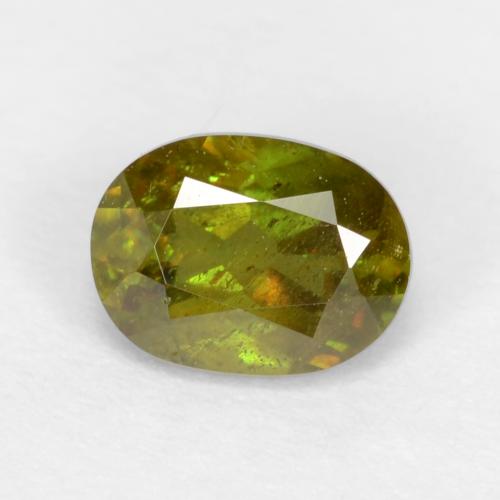 Medium Green Sphen Edelstein - 0.6ct Oval facettiert (ID: 544434)