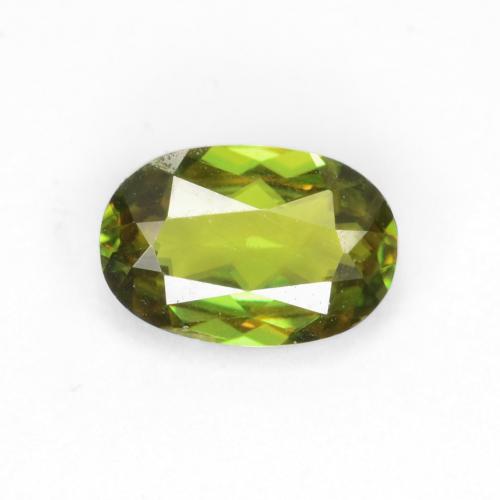 Травянисто-зелёный Сфен Камень - 0.6ct Фасетный Овал (ID: 544600)
