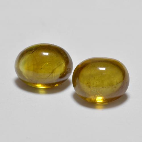 Золотой Сфен Камень - 0.9ct Овал Кабошон (ID: 578714)
