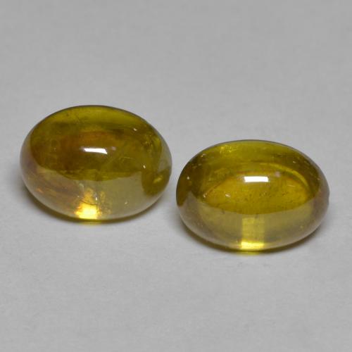 Earthy Yellow Sphen Edelstein - 2ct Oval Cabochon (ID: 585703)