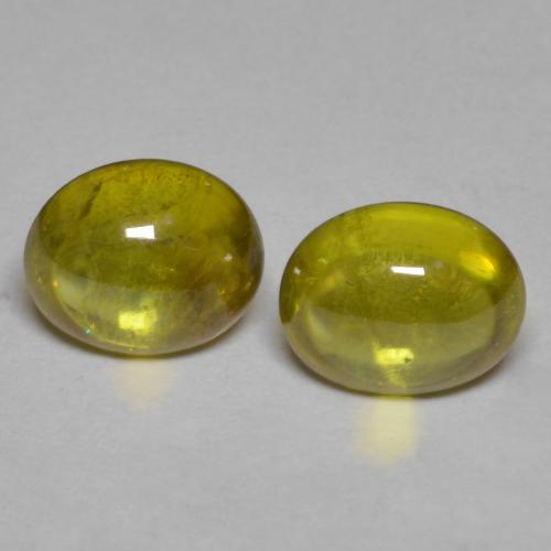 Lemon Yellow Sphene Gem - 1.1ct Oval Cabochon (ID: 585709)