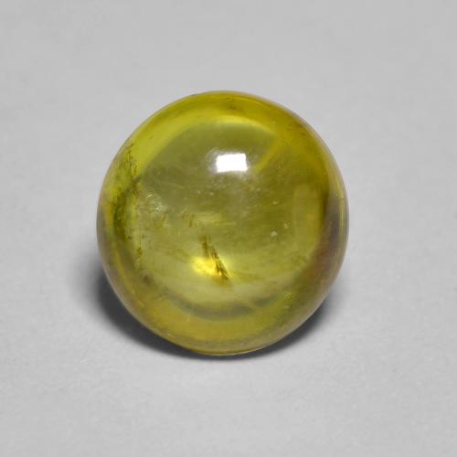 Yellowish Green Sphene Gem - 1.5ct Oval Cabochon (ID: 586709)