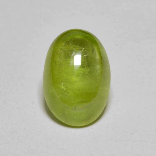 Lively Yellowish Green Sphene Gem - 3ct Oval Cabochon (ID: 586734)