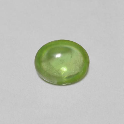 Esfena Verde Cabujón Óvalo de 5,8 x 4,8mm de Sri Lanka, peso de 0.74ct, piedra preciosa No tratado de forma natural en claridad Transparente, Esfena de 1 pieza: el color es Verde vivo, dureza Mohs de 5 - 5.5, Photo A