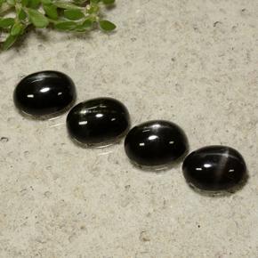 1.4ct Oval Cabochon Black Star Diopside Gem for sale 1.4ct Oval Cabochon Black Star Diopside Gem (ID: 499290)