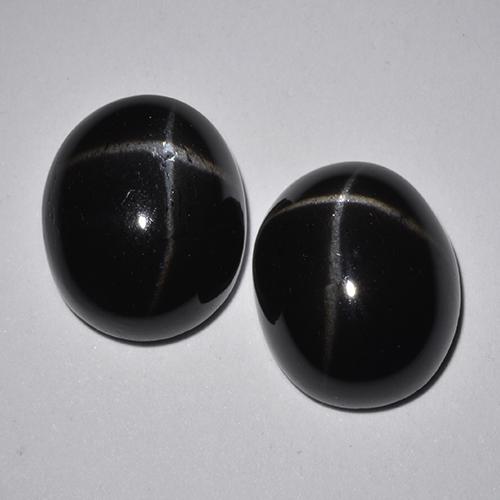 Black Star Diopside Gem - 4.2ct Oval Cabochon (ID: 514284)