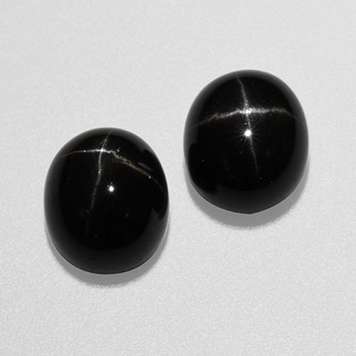 Black Star Diopside Gem - 5.7ct Oval Cabochon (ID: 519157)
