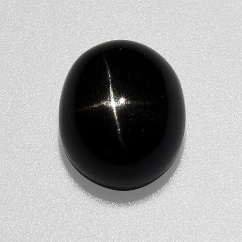 Black Star Diopside Gem - 6.2ct Oval Cabochon (ID: 519160)