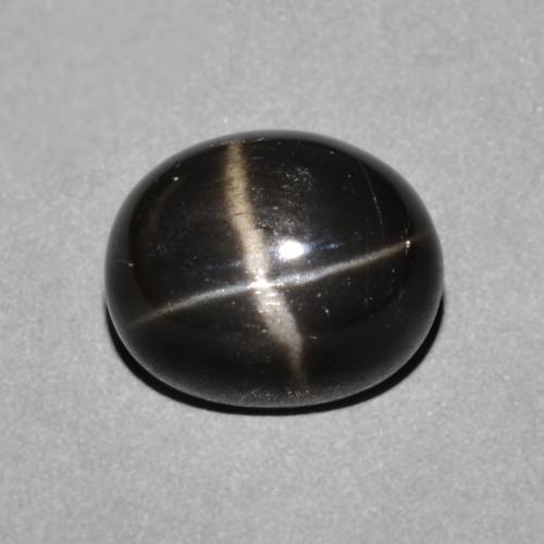 Diópsido Estrella Cabujón Óvalo de 4,86 ct de India, Dimensión 11,1 x 9,2mm, Claridad Opaco, Piedra preciosa natural No tratado, 1 pieza de Diópsido Estrella en color Negro, Dureza Mohs de 5 - 6, ID del producto: 642077, Photo A