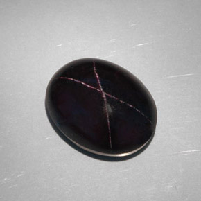 28.81 ct Black Star Garnet Stone, Natural Star Garnet in Oval Cabochon Shape for Sale